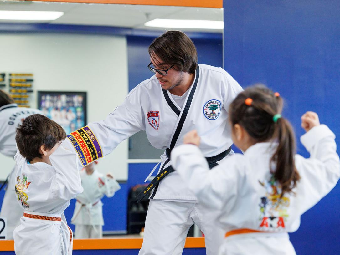 Elijah Solis teaching in a Taekwondo class