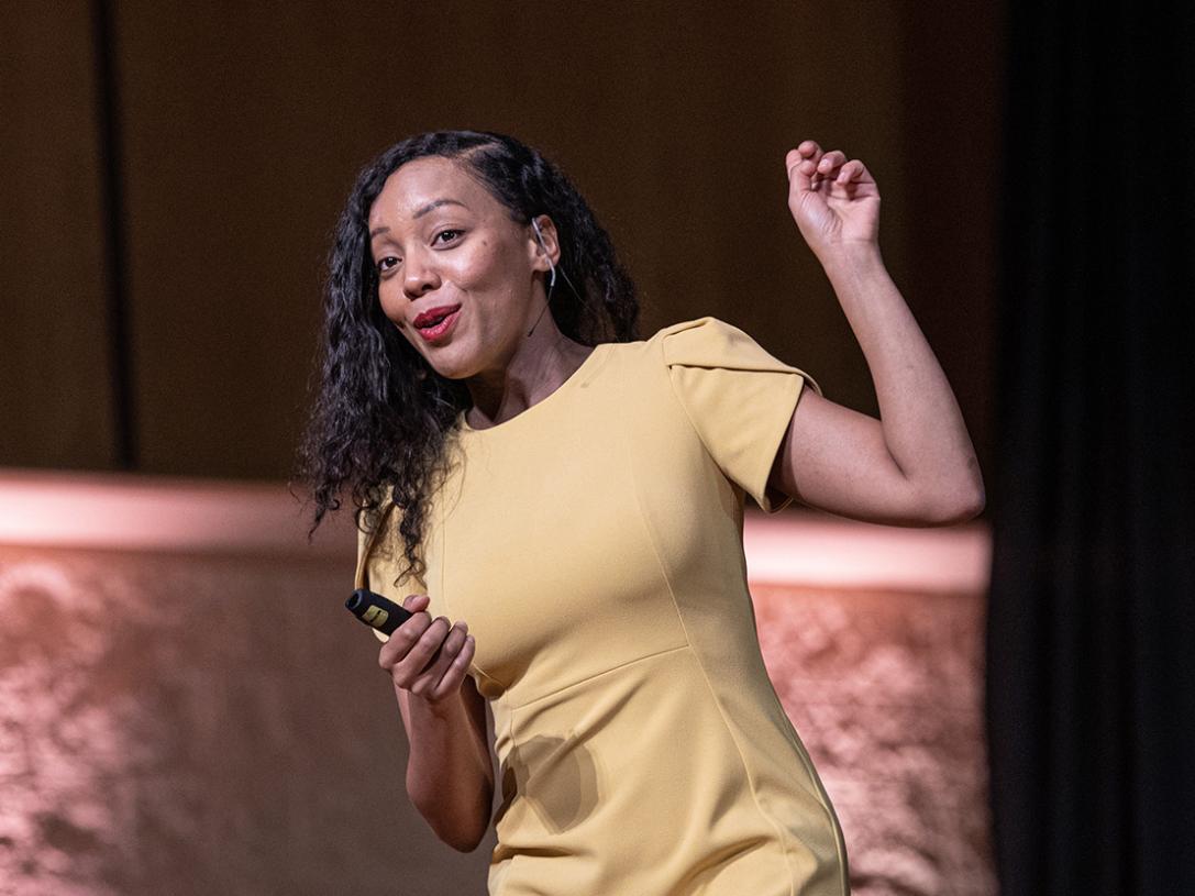 Omnibus speaker Moogega Cooper speaks to the audience in Auer Performance Hall