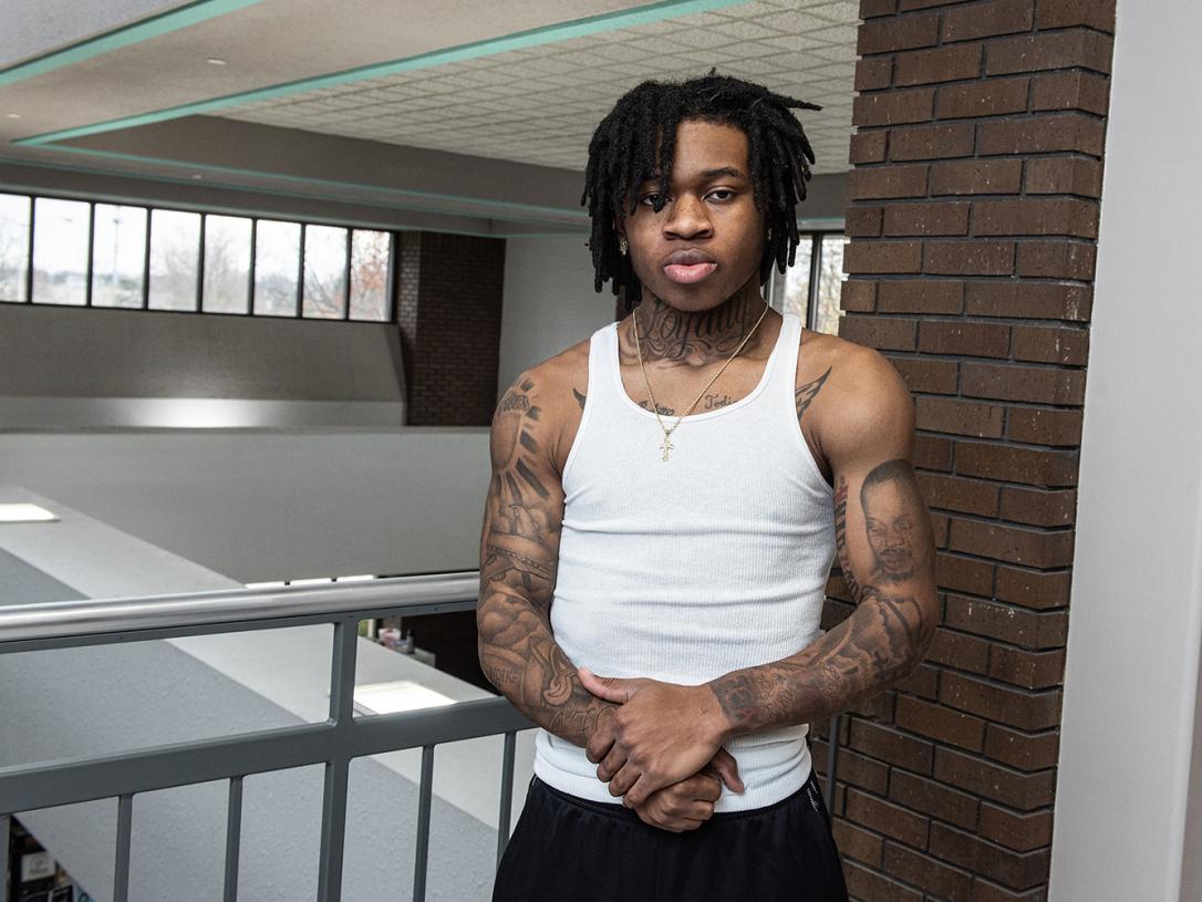 Triston Stevens poses in the lobby of the engineering building at Purdue Fort Wayne.