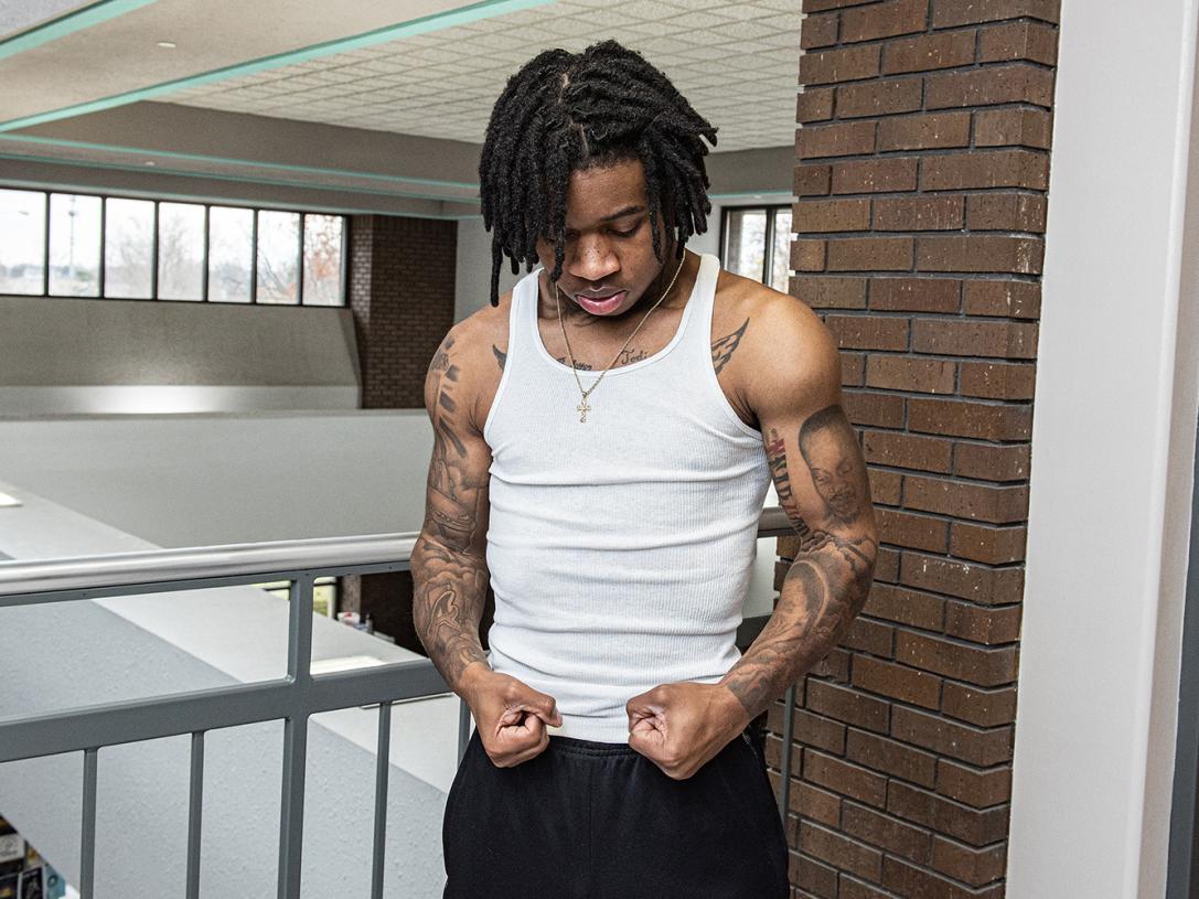 Triston Stevens poses in the lobby of the engineering building at Purdue Fort Wayne.