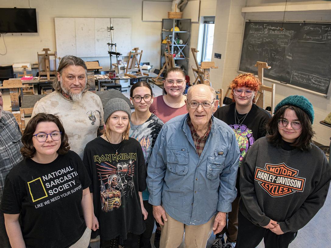 Alan Grinsfelder with members of his painting class.
