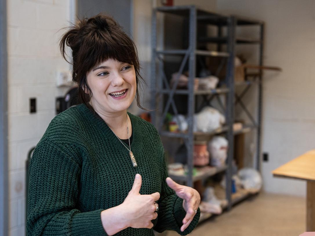 Portrait of Emily Whisman in an art studio