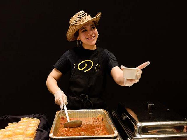 Serving up chili at the Chancellor's chili fest