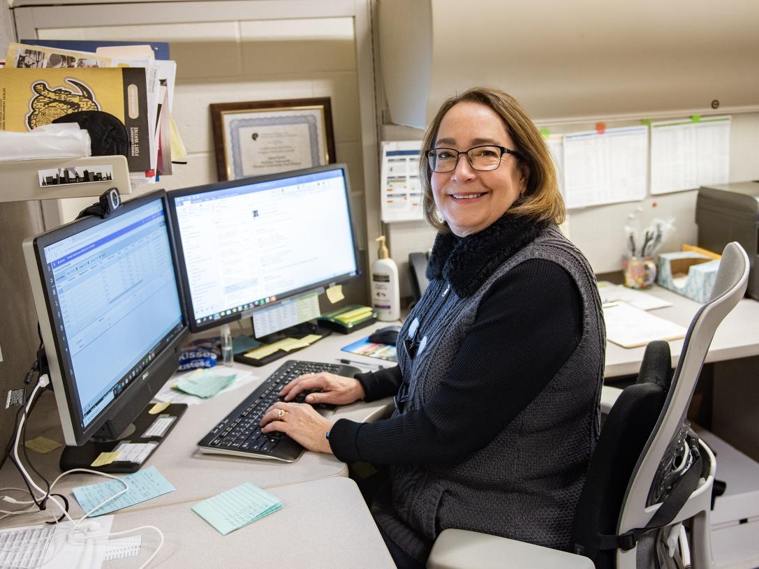 Jana Lese is working at her desk