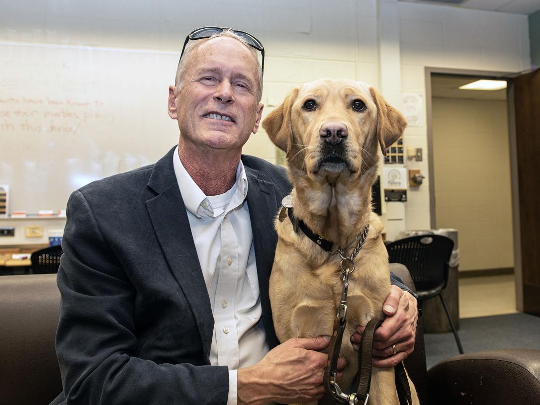 Jim Platzer and his leader dog, Maggie