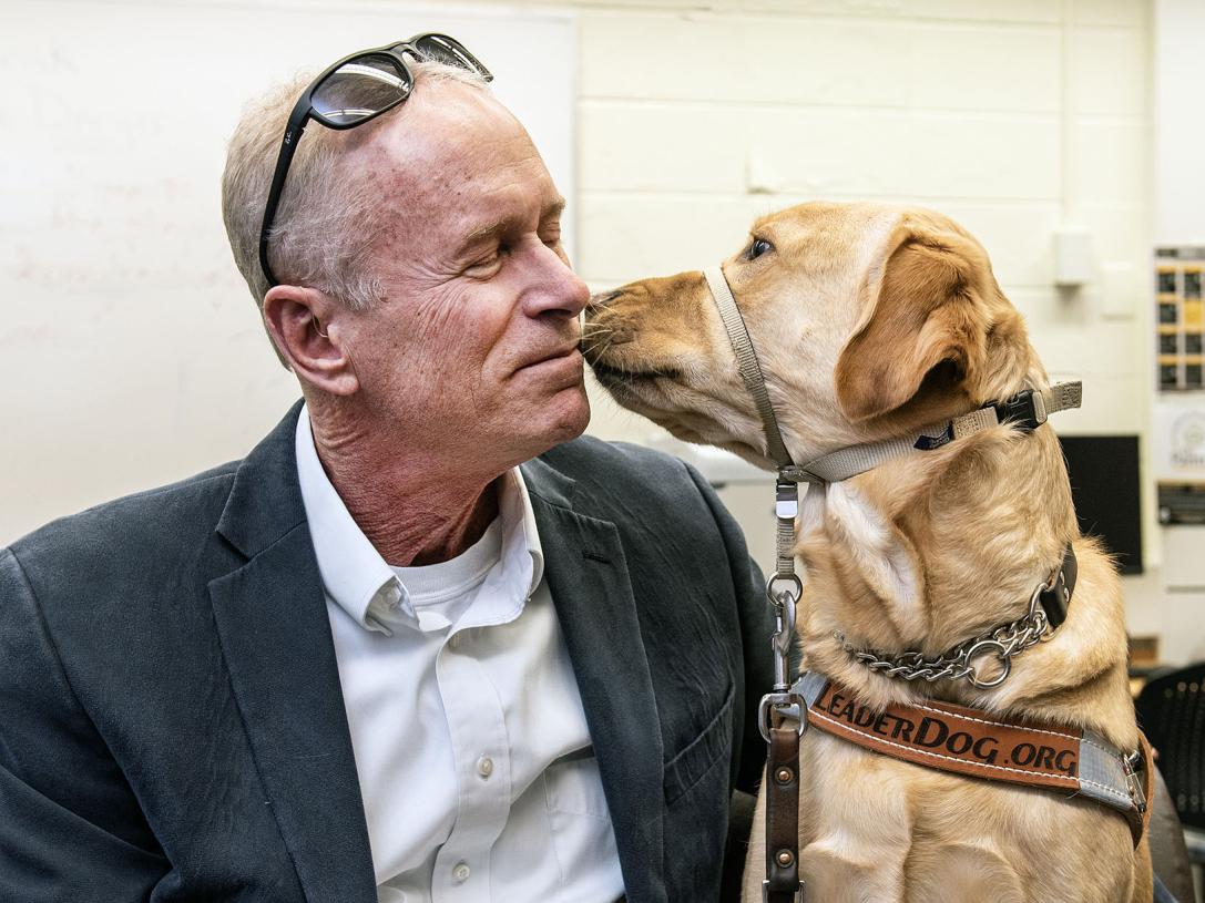 Jim Platzer and his leader dog, Maggie