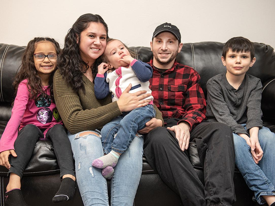 Estefany Catota and her partner, Tye Slayback, with their children Sofie, 7, Rosalina, 1, and Kalden, 9.