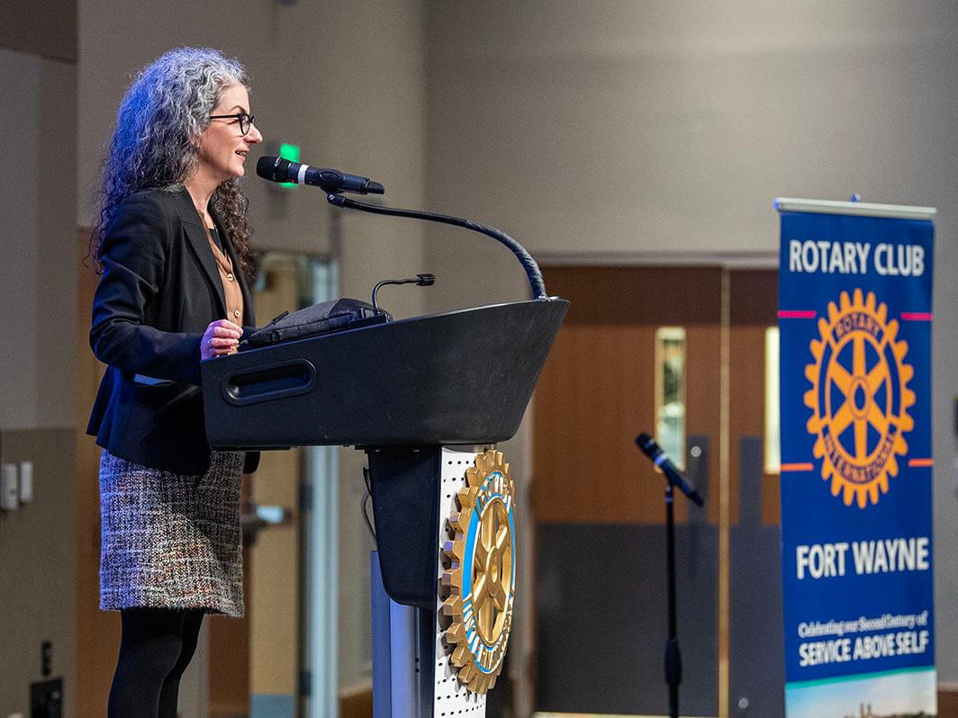 Janet Badia, dean of the College of Liberal Arts, speaks to high school students at the Fort Wayne Rotary Club's Peace and Conflict Resolution conference 