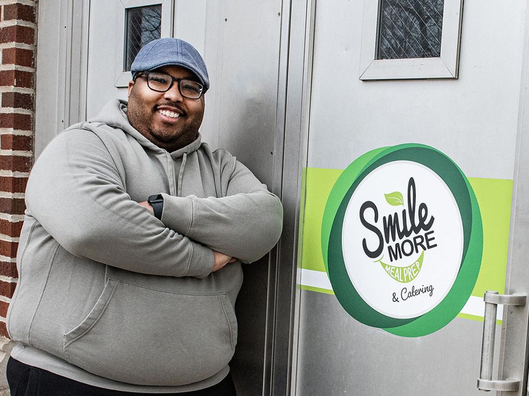 Terel Linn standing outside of his business, Smile More Meal Prep