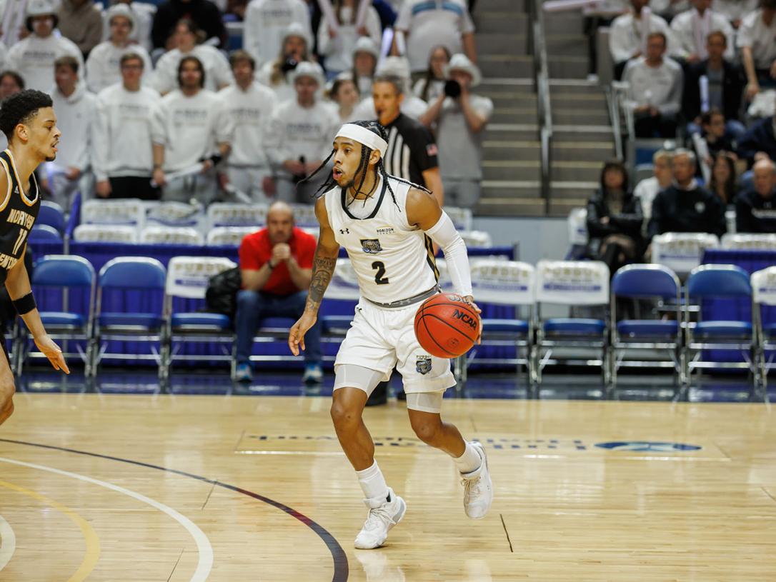 Damian Chong-Qui is playing basketball