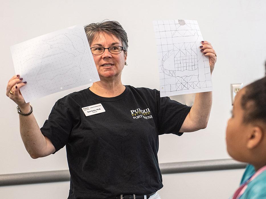 Terri Swim is teaching in a classroom