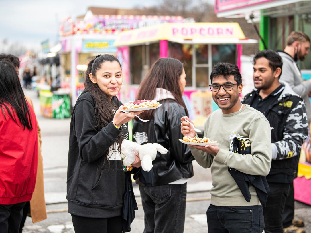 Students having food at the Big Night
