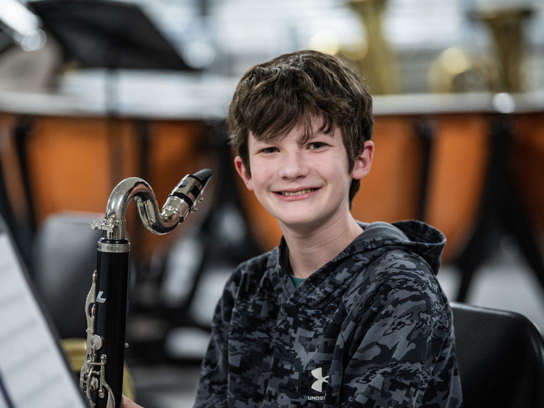 A Fusion Band student with his bass clarinet.