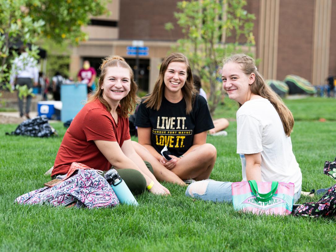 Students sitting outdoors
