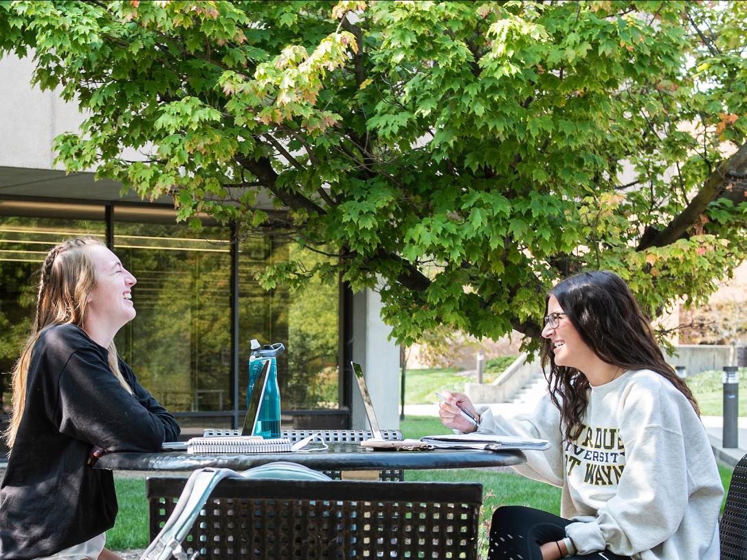 Students sitting outdoors