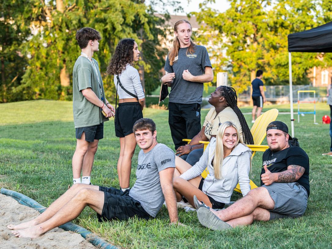 Students at a volleyball event for student housing.
