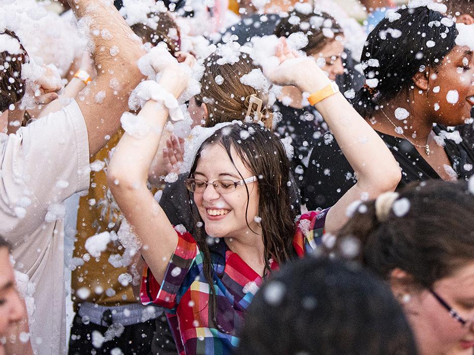 Lilly Stotlar is dancing in foam bubbles.