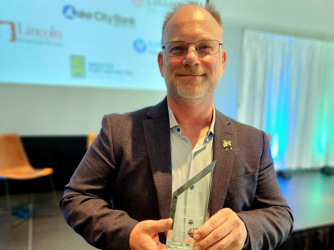 Dan Boylan with his Champions of Change award