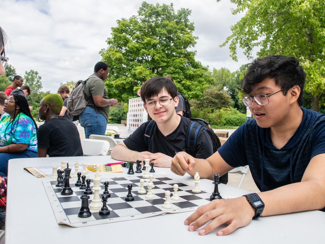 Students playing chess