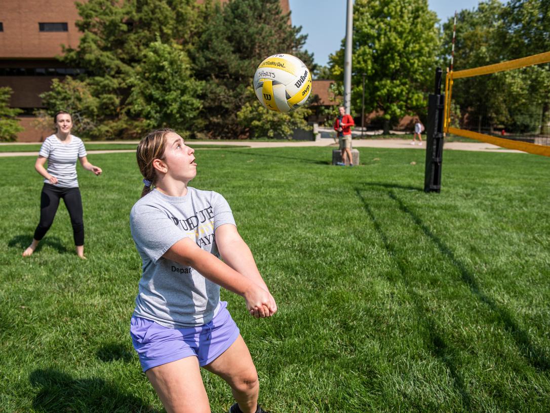 Students playing volleyball