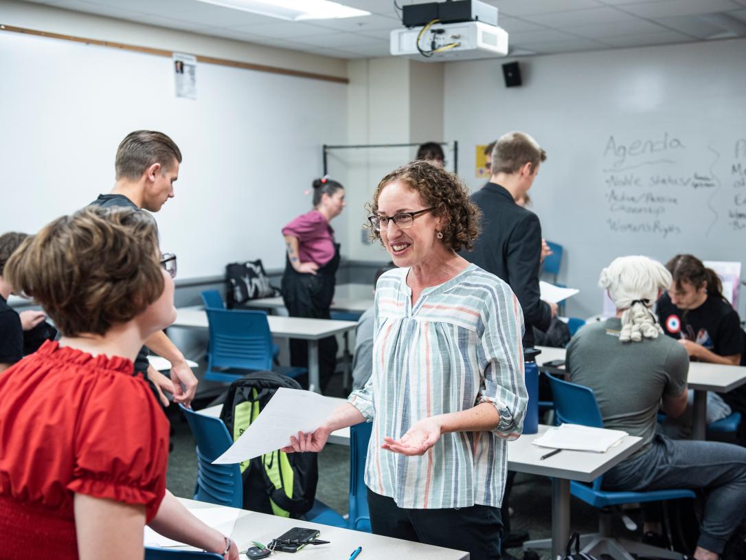 Professor talking to student