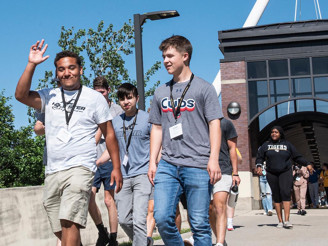 Students walking across campus during New Student Orientation.