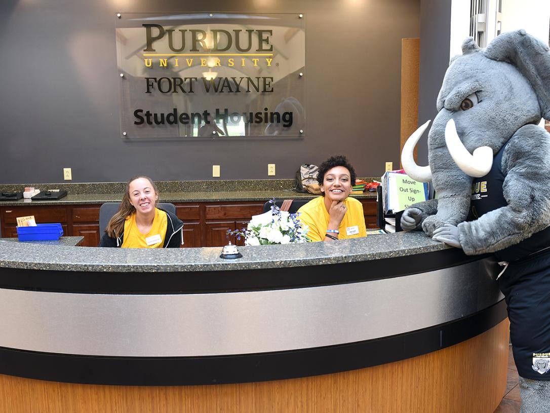 Student workers sitting at desk