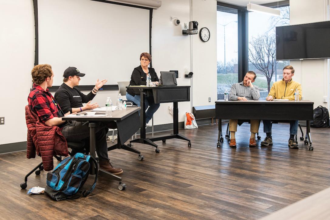 Students conducting a debate