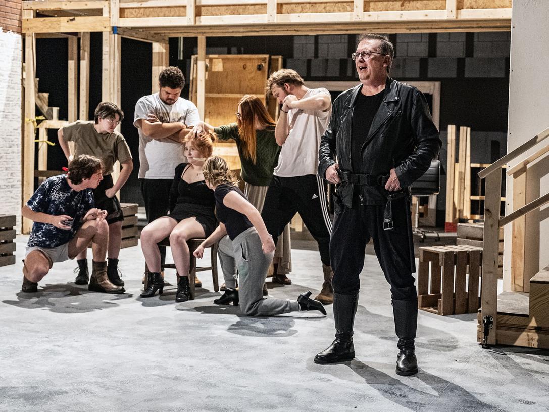 Professor Jeff Casazza performs the role of Lockstock onstage.