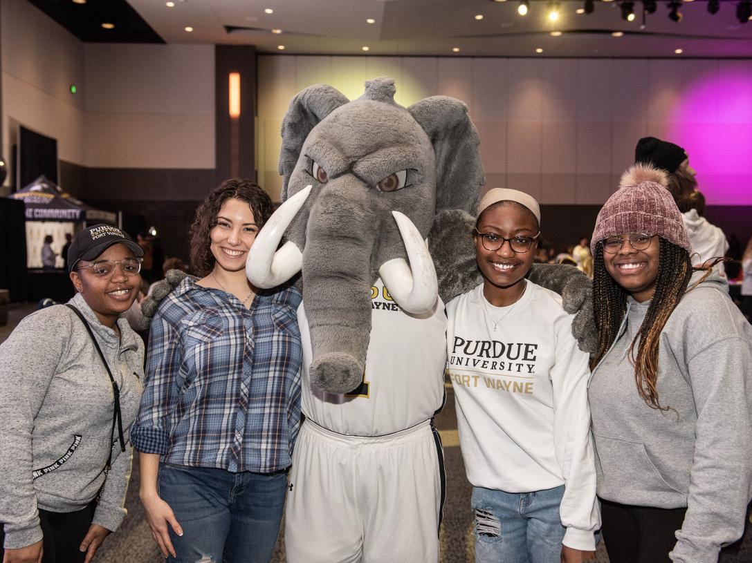 Students posing with Mastodon