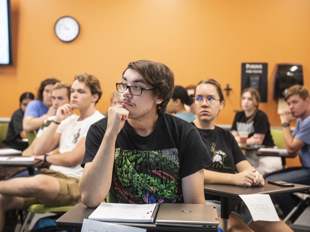 COLA students listen to a lecture.