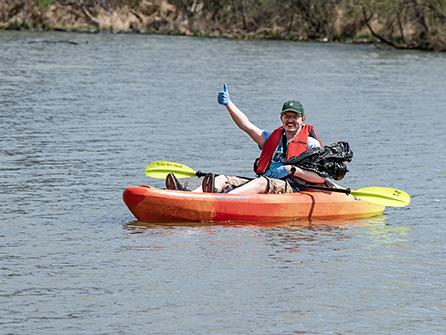 A student is in a kayak