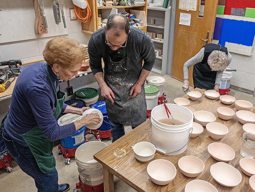 Preparing bowls for firing