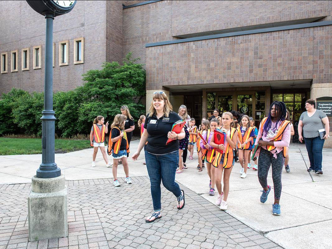 Children walking on campus