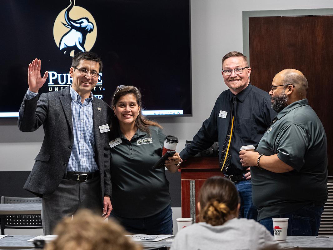 PFW employees at a presentation for prospective students.