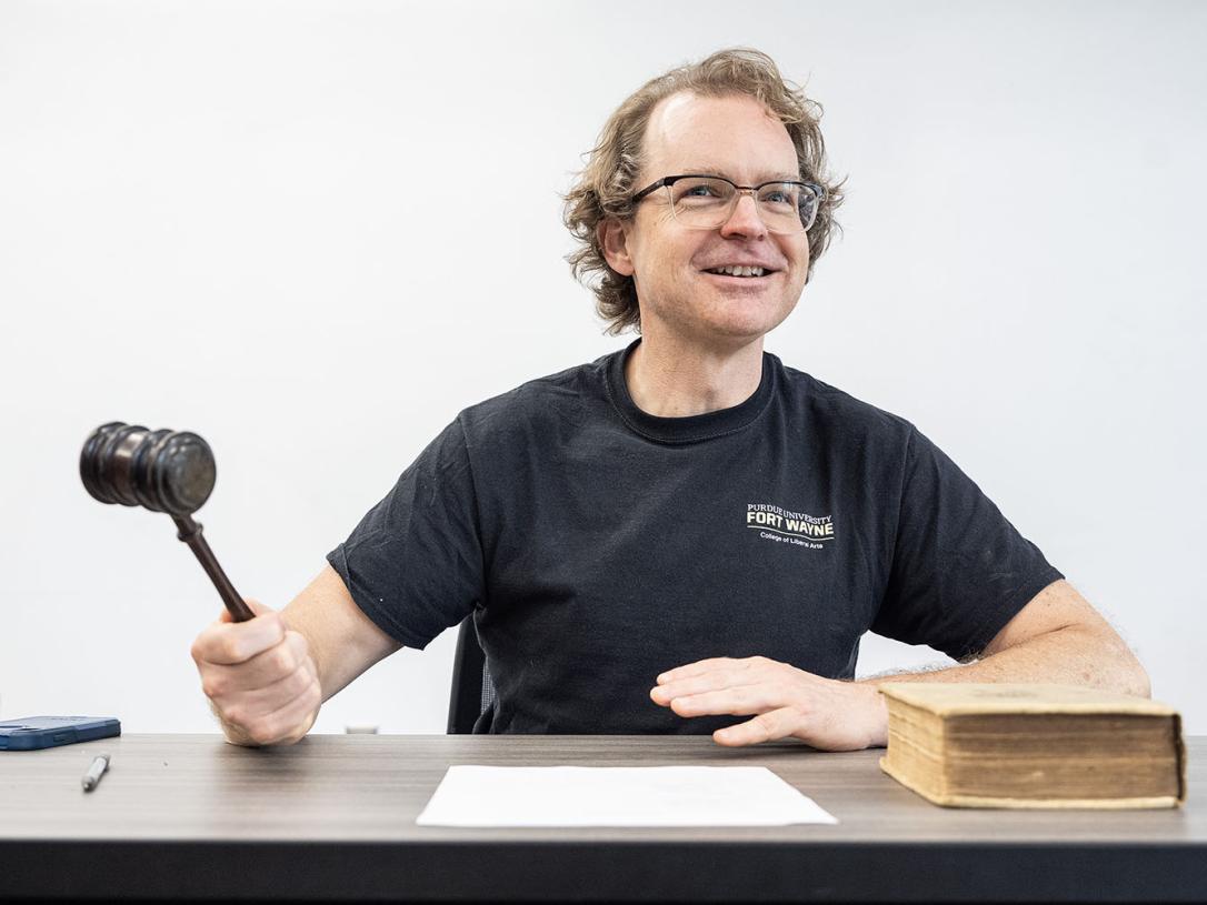 Professor Damian Fleming serving as the judge at a mock trial