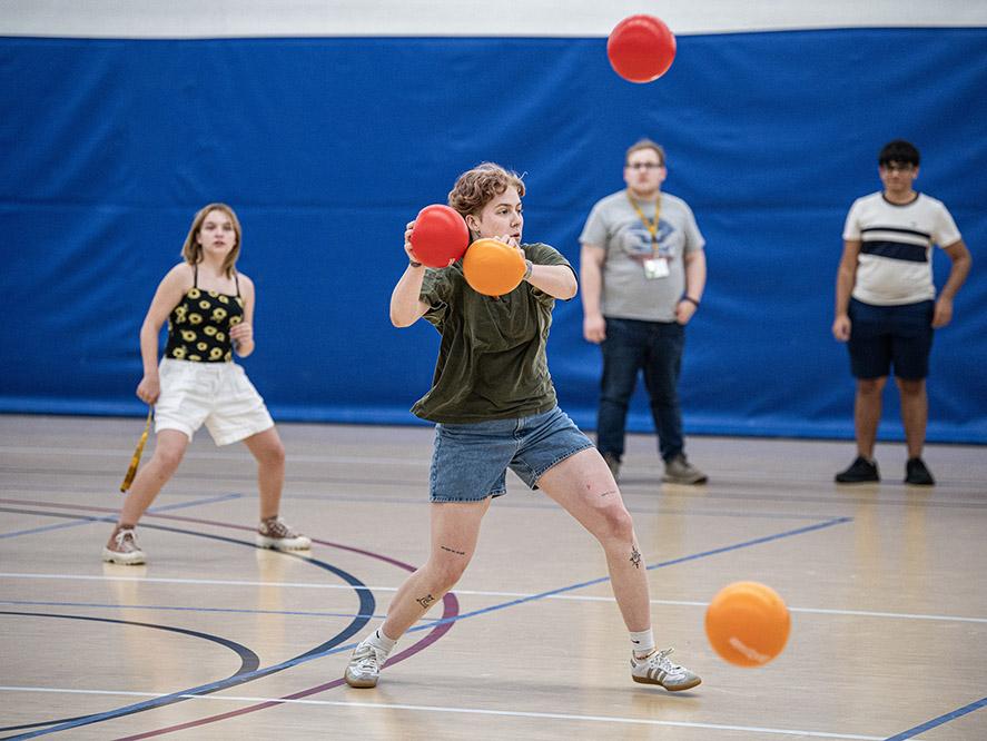 Students are playing dodgeball at NSO orientation