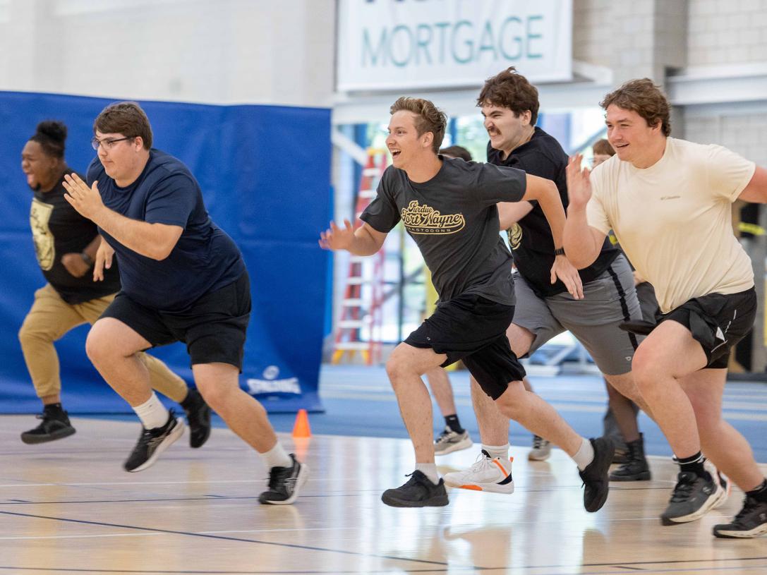 Students are playing dodgeball at NSO orientation