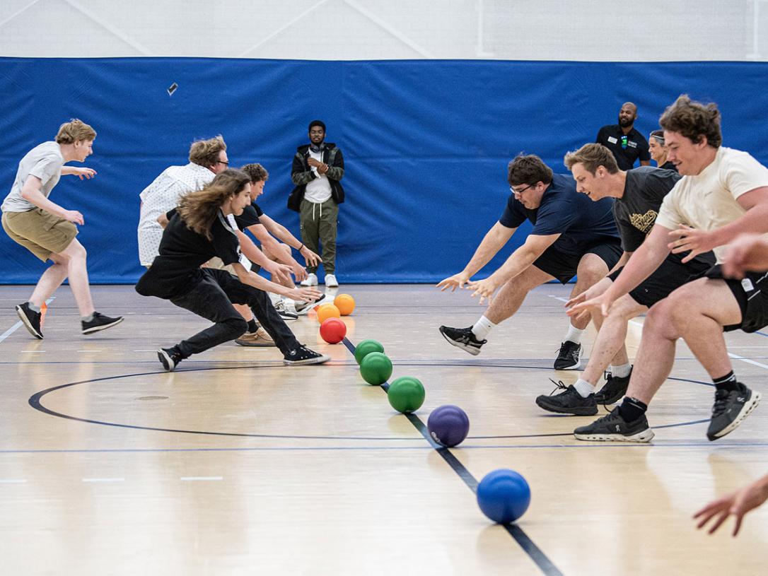 Students are lined up to start a game of dodgeball
