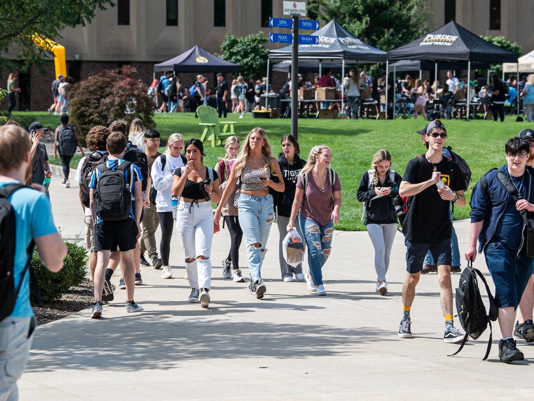 Students are walking down PFW's Mastodon Way