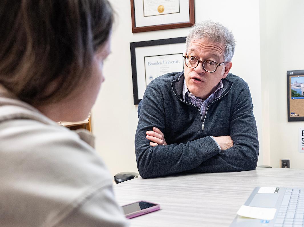Student and Professor in an office