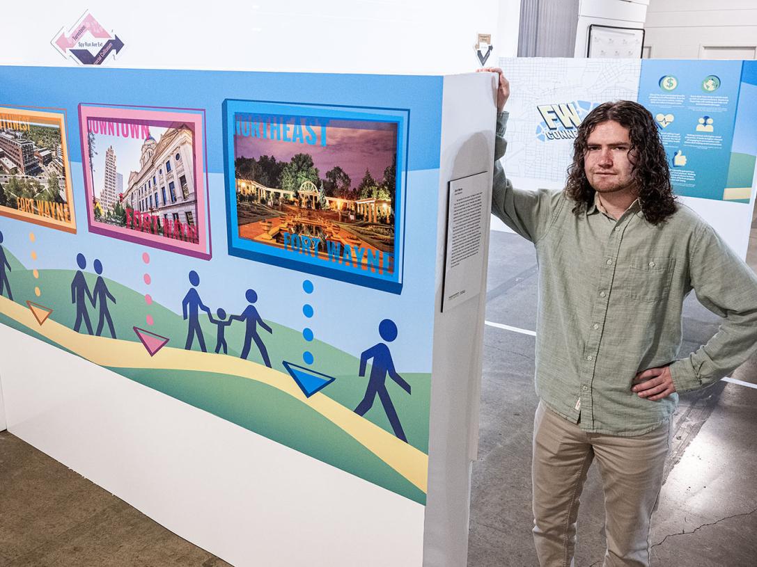 Zach Macke with a display he created