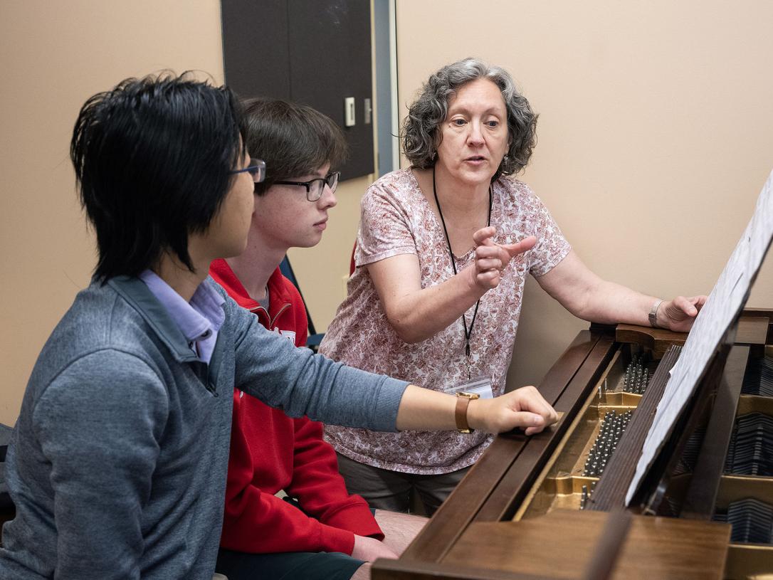 Susan Dorion is working with music students