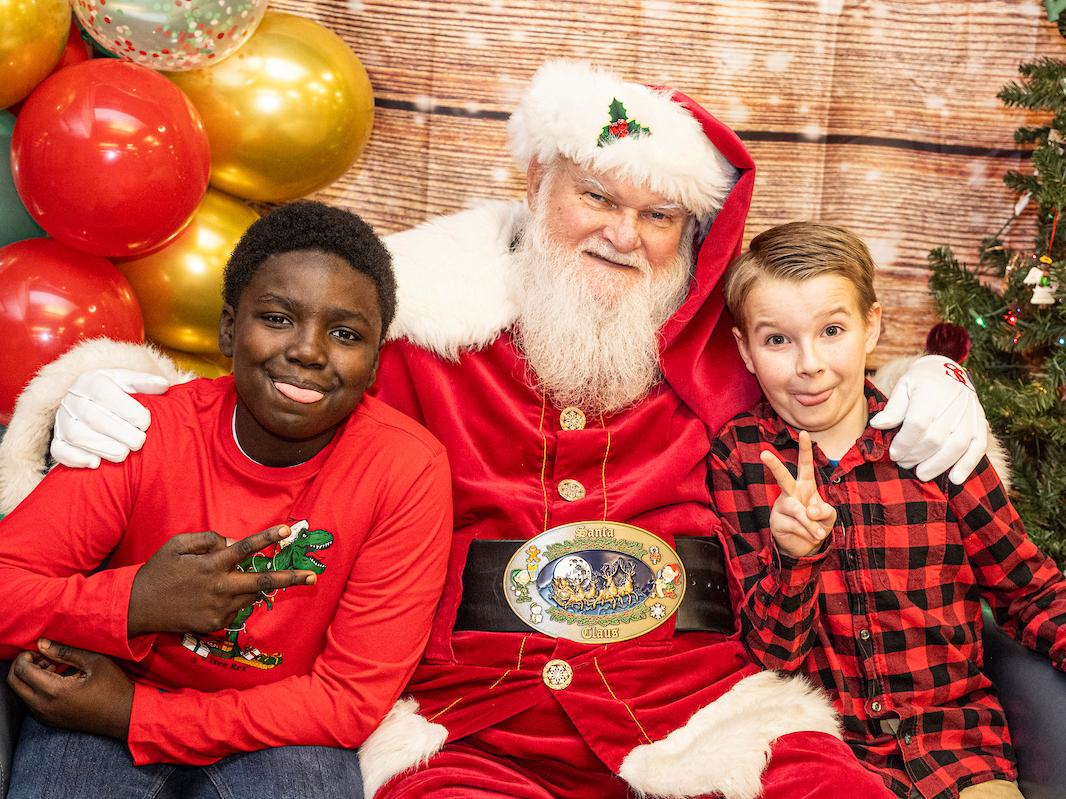 Kids posing with Santa