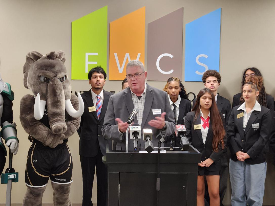 Carl Drummond is speaking at a news conference