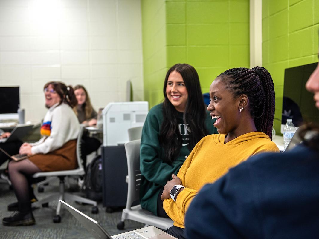 Students sit and listen during a communication class