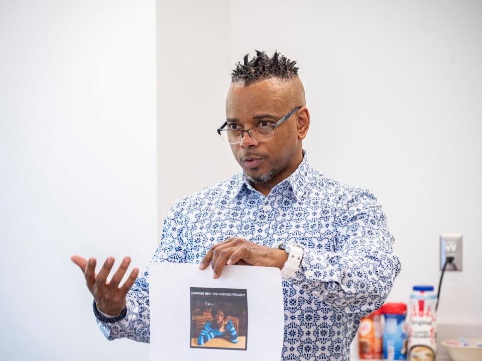 Dr. Curtis Crisler explains poetry to a Collaboratory class.