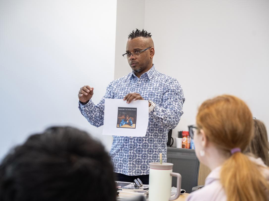 Person showing a class a picture