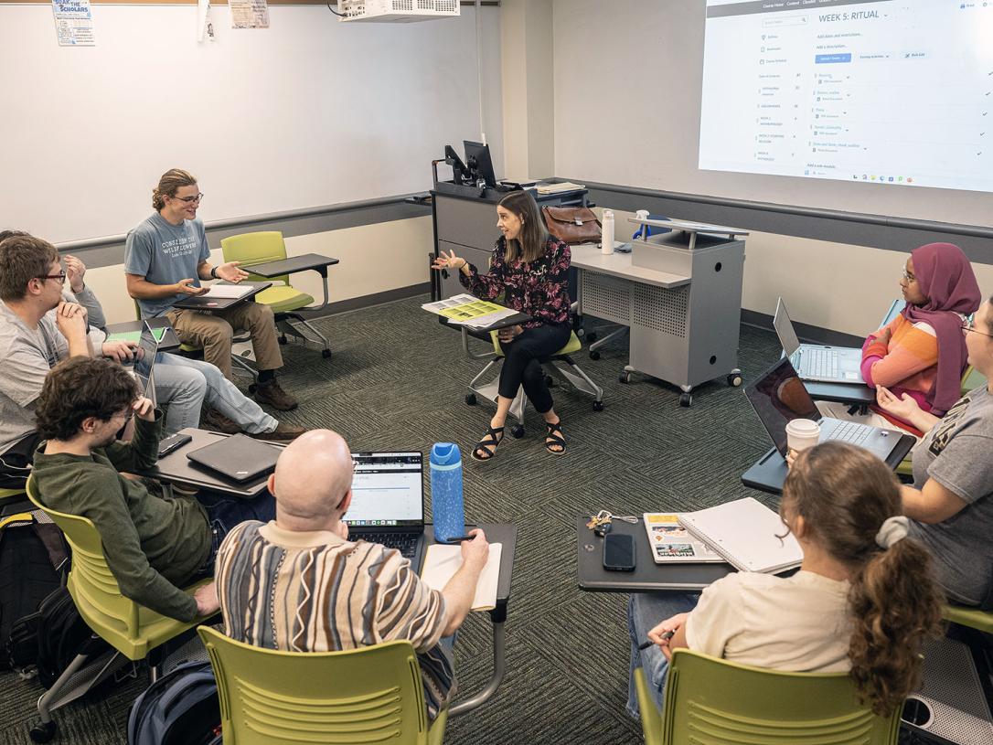 Students are sitting in a circle