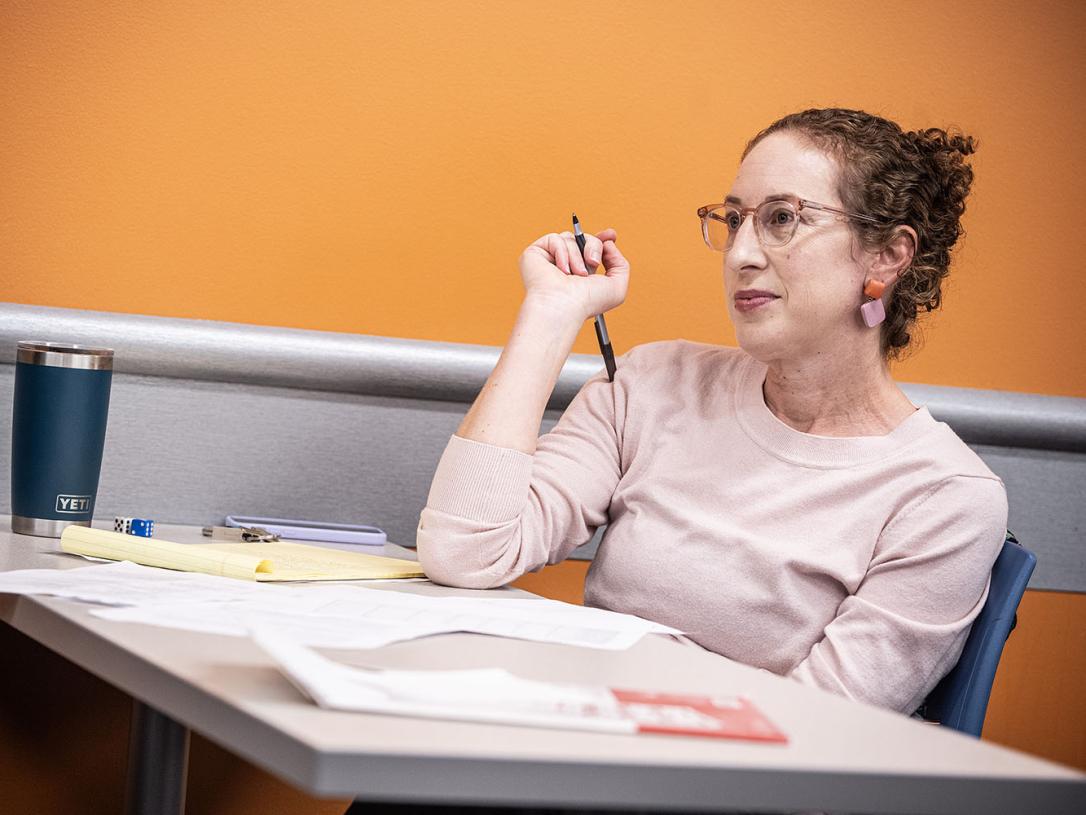 A student is sitting in a classroom